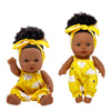 Lalka ciemnoskóra Afro w żółtym ubranku bobas 26 cm