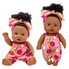 Lalka ciemnoskóra Afro w różowym ubranku bobas 26 cm