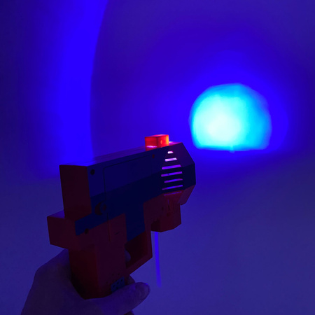 Automatyczny pistolet do baniek pixel światło odgłosy strzelania na baterie